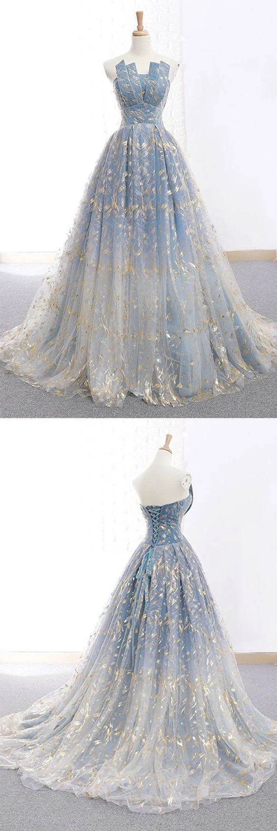 Robe de bal bleue avec dentelle délicate à la feuille d'or