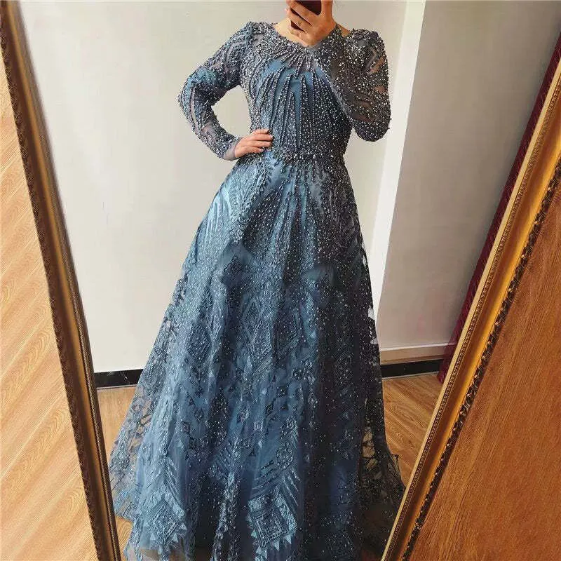 Robe de bal élégante bleu encre à manches longues et appliques à paillettes