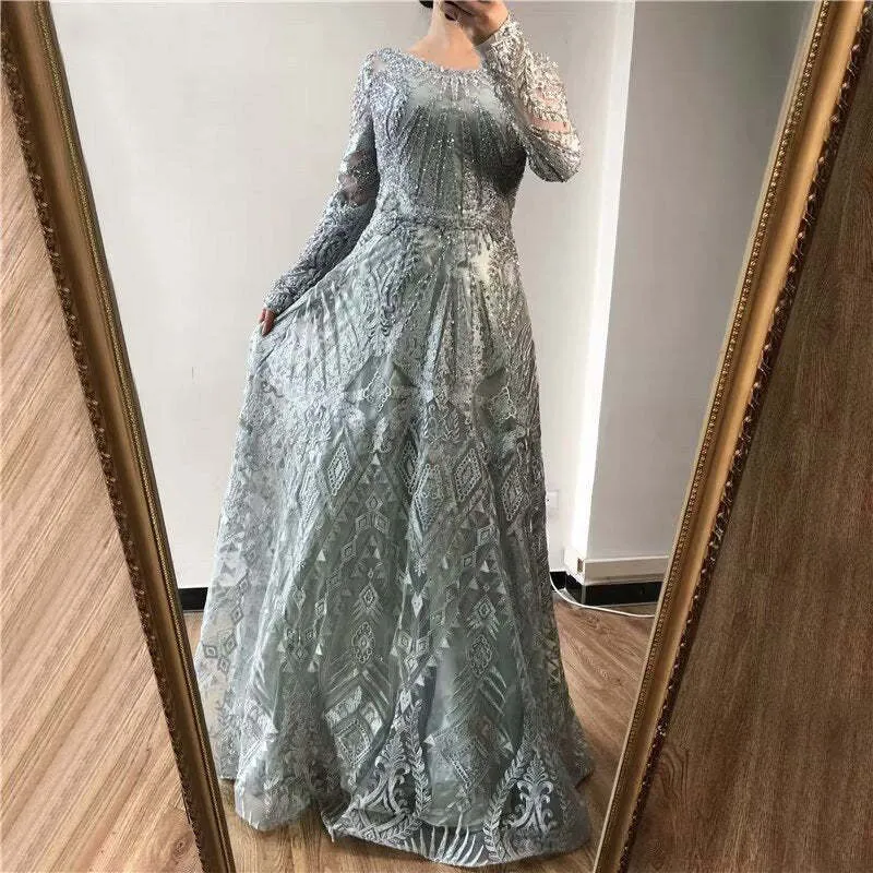 Robe de bal élégante bleu encre à manches longues et appliques à paillettes