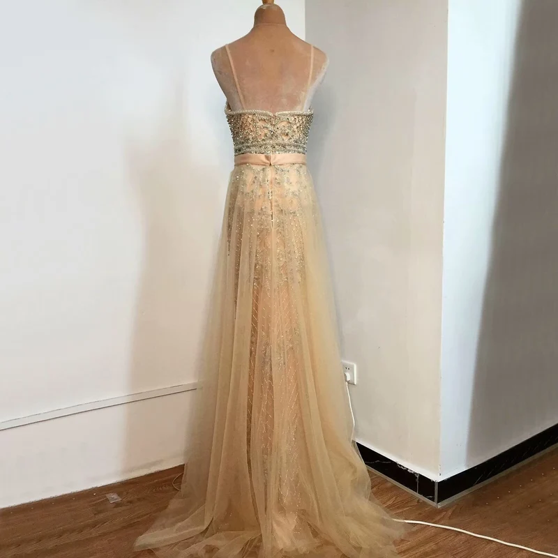Robe de bal en maille pailletée champagne, sans manches, coupe trapèze, dos nu