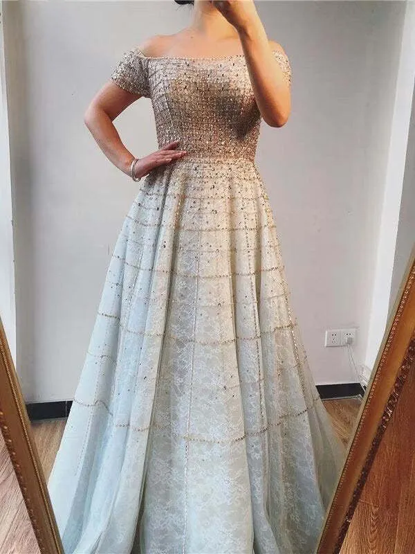 Robe de bal élégante à paillettes, épaules dénudées, manches longues, coupe trapèze