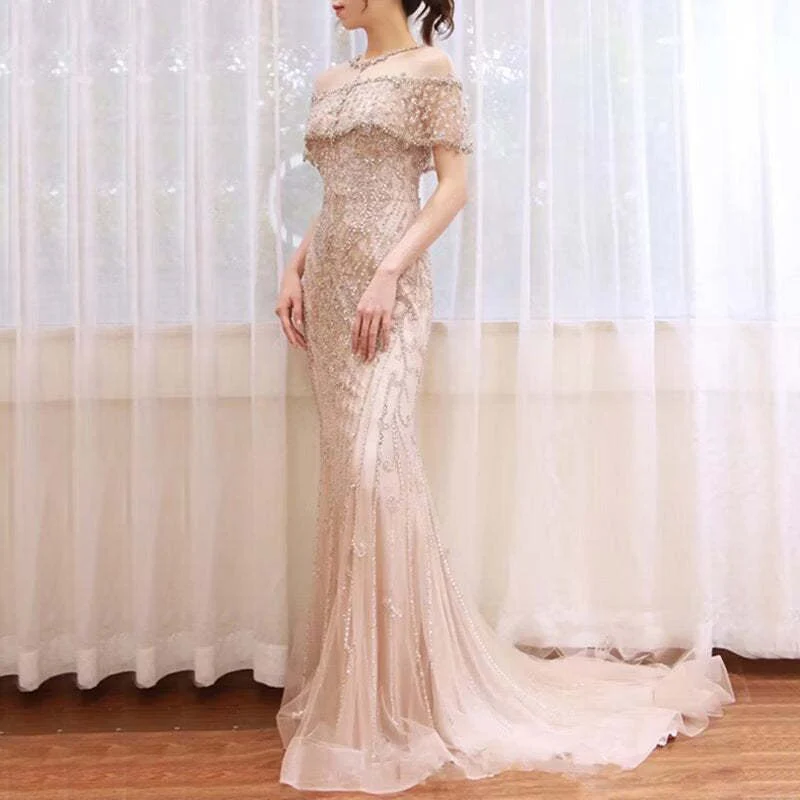 Robe de soirée longue sirène luxueuse sans bretelles à paillettes et perles