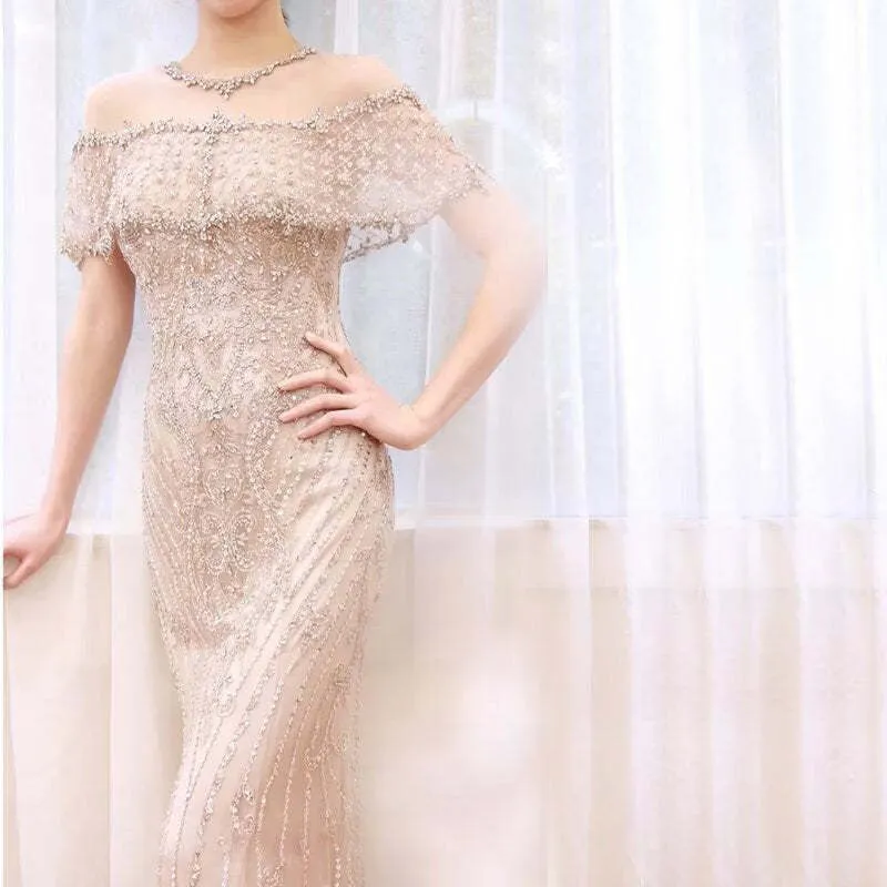 Robe de soirée longue sirène luxueuse sans bretelles à paillettes et perles