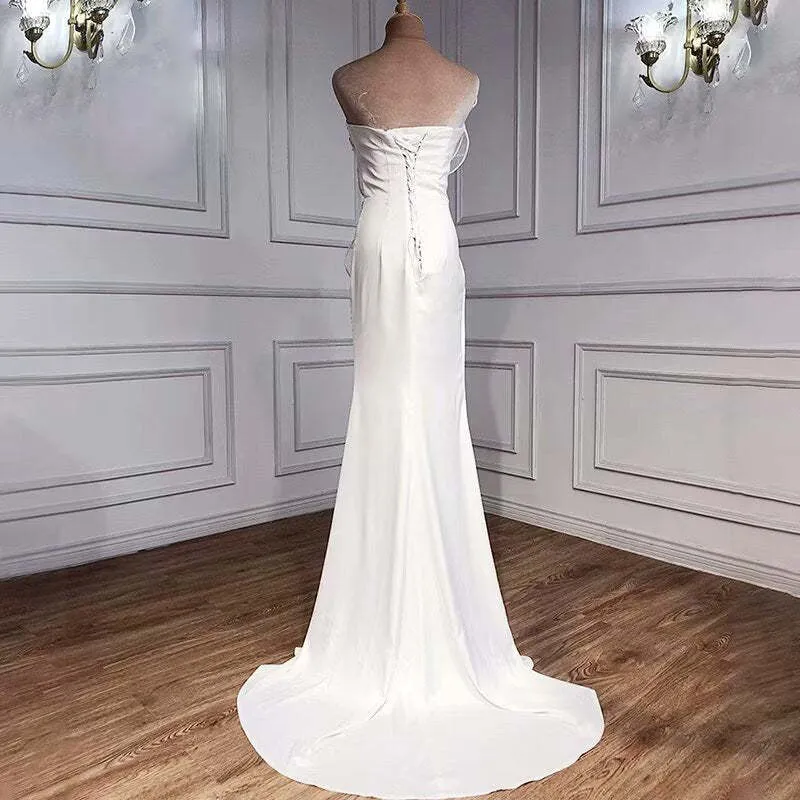 Robe de bal sirène blanche élégante et longue, fendue sur le côté, avec appliques à sequins
