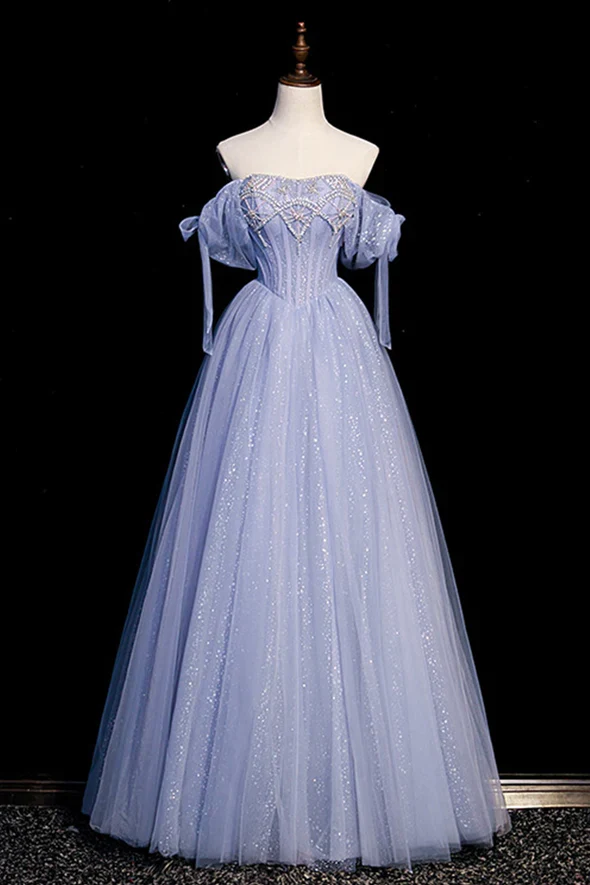 Robe de bal longue en tulle bleu avec perles