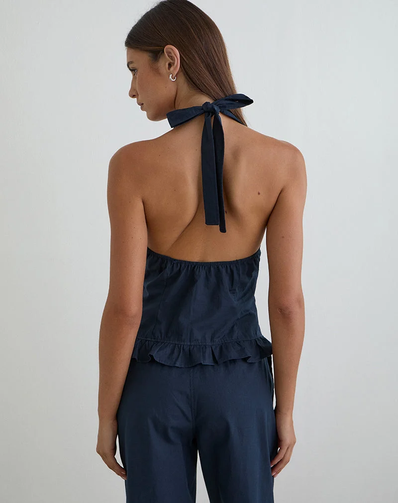 Haut à col licou Tamzen, bleu marine foncé, avec ourlet à volants