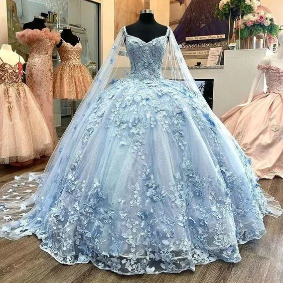 Superbe robe de soirée en tulle bleu coupe trapèze