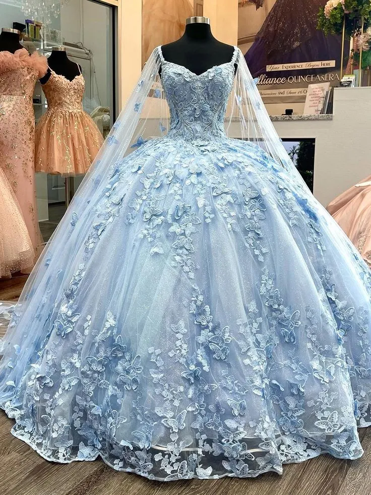 Superbe robe de soirée en tulle bleu coupe trapèze