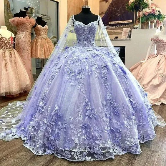 Superbe robe de soirée en tulle bleu coupe trapèze