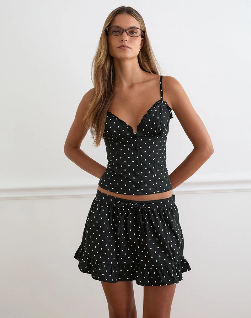 Mini-jupe Yasumi à pois noirs unis