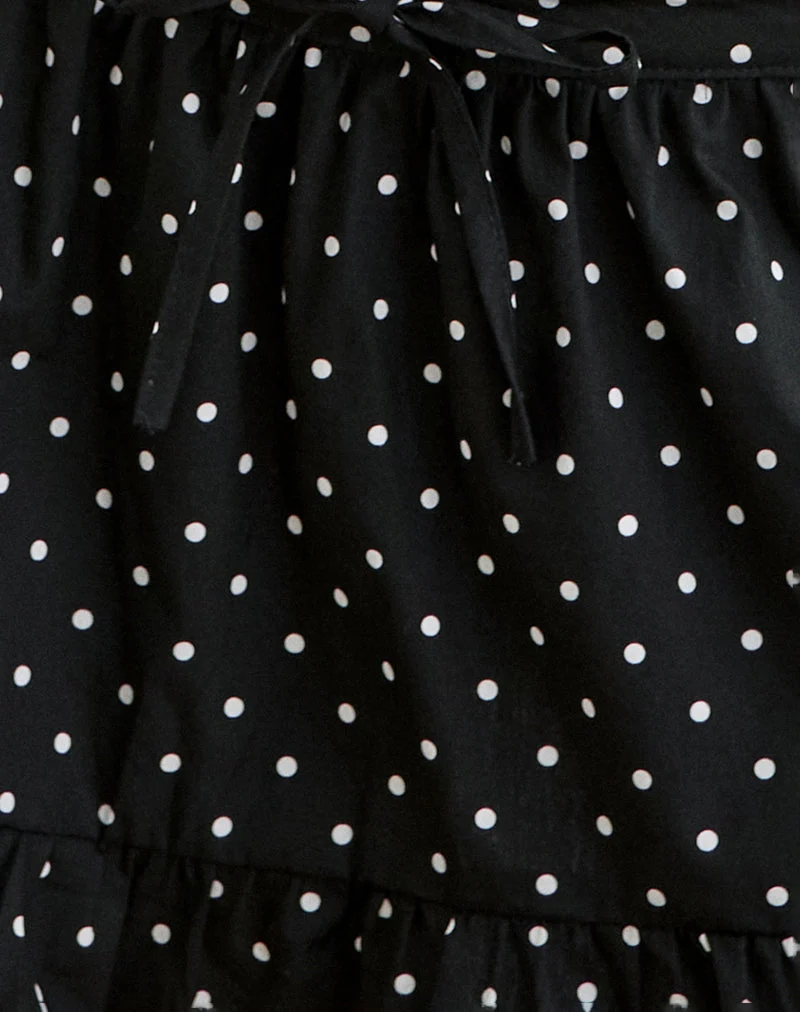 Mini-jupe Yasumi à pois noirs unis