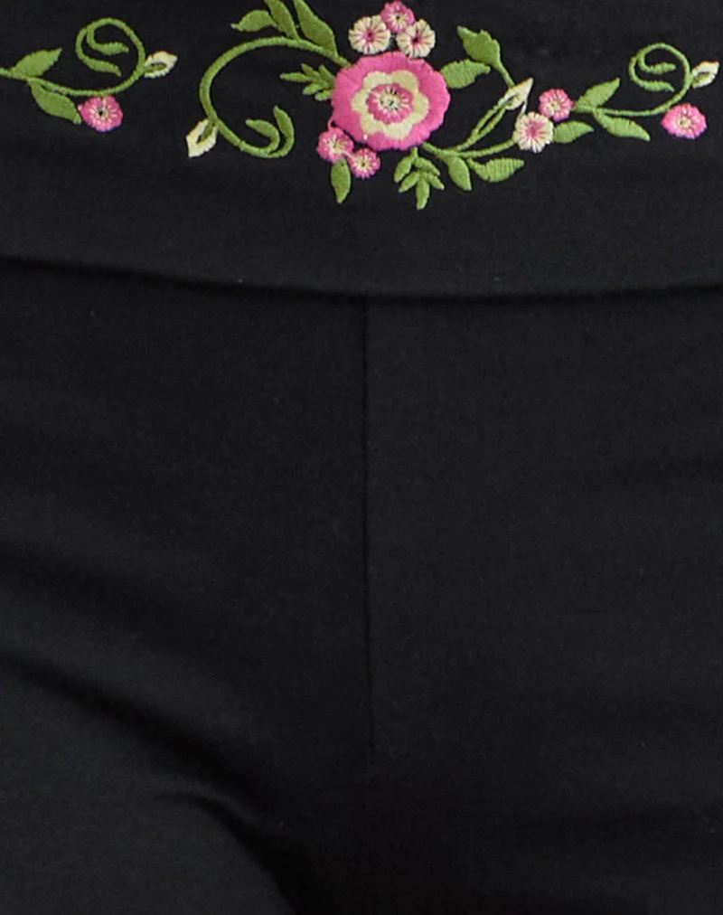 Short « Sea » à revers, noir, avec broderie florale en spirale