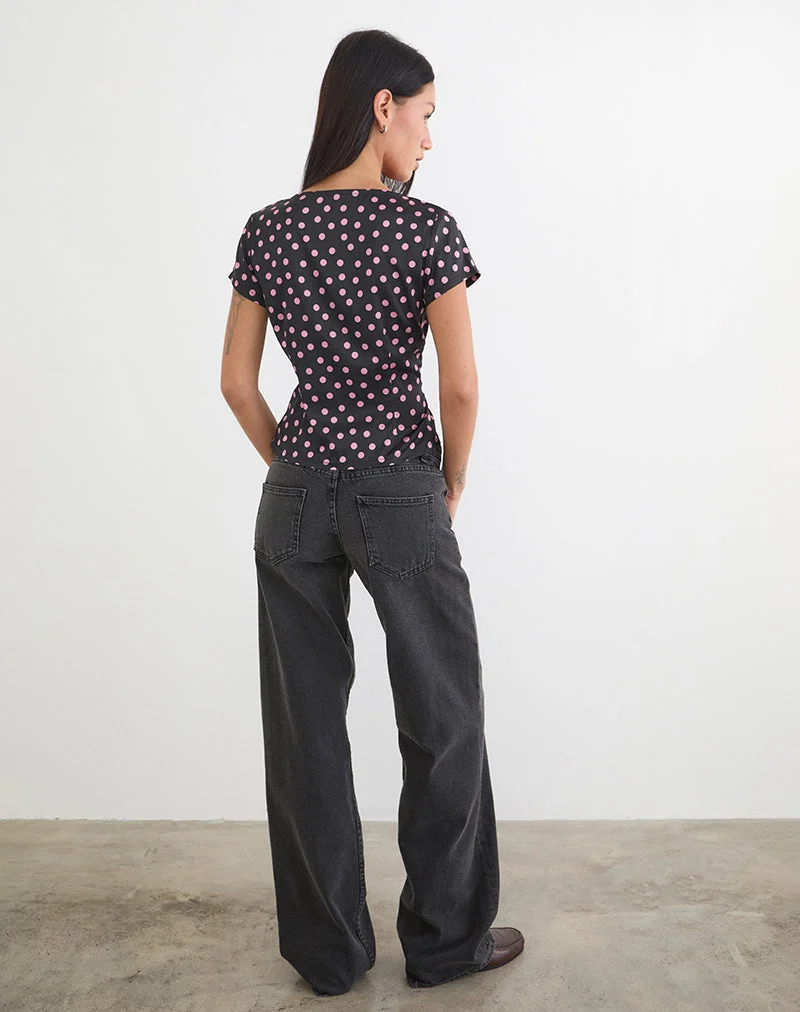 Top Asena en satin noir parsemé de pois roses