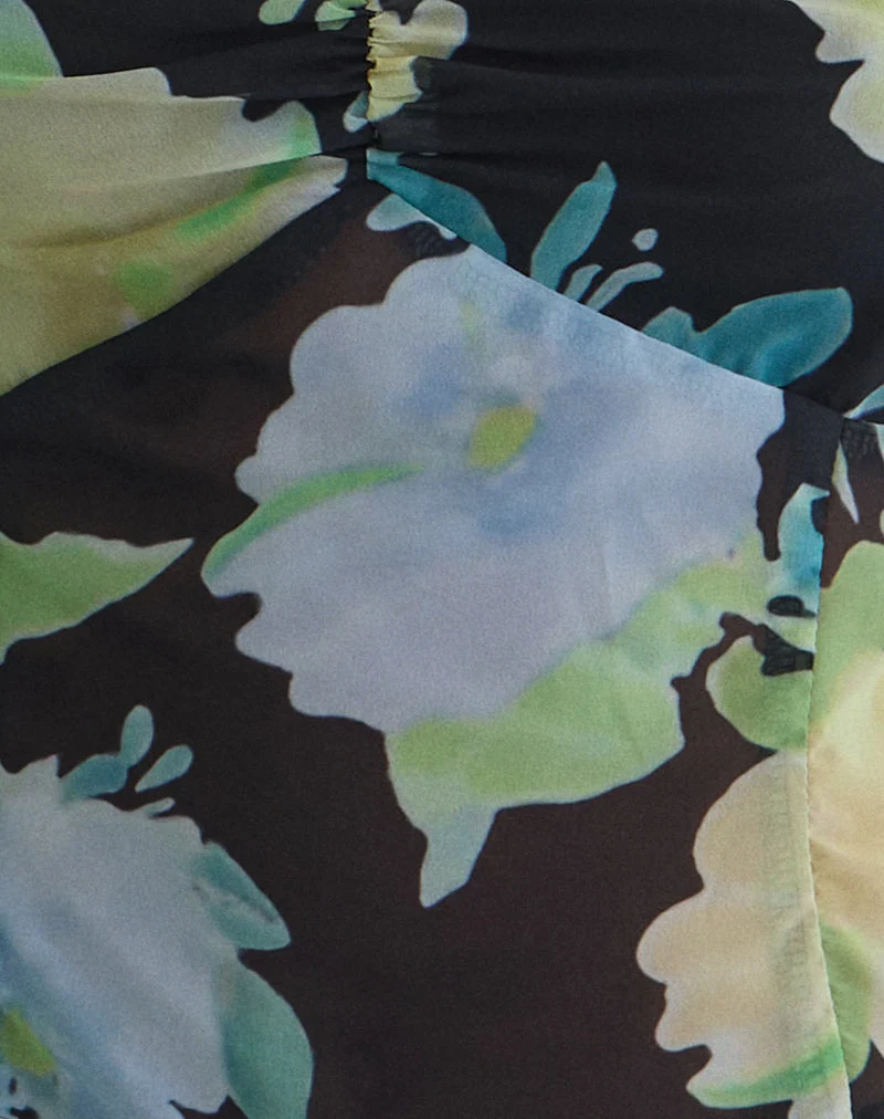 Top Selita en mousseline noire avec imprimé fleurs en cristal