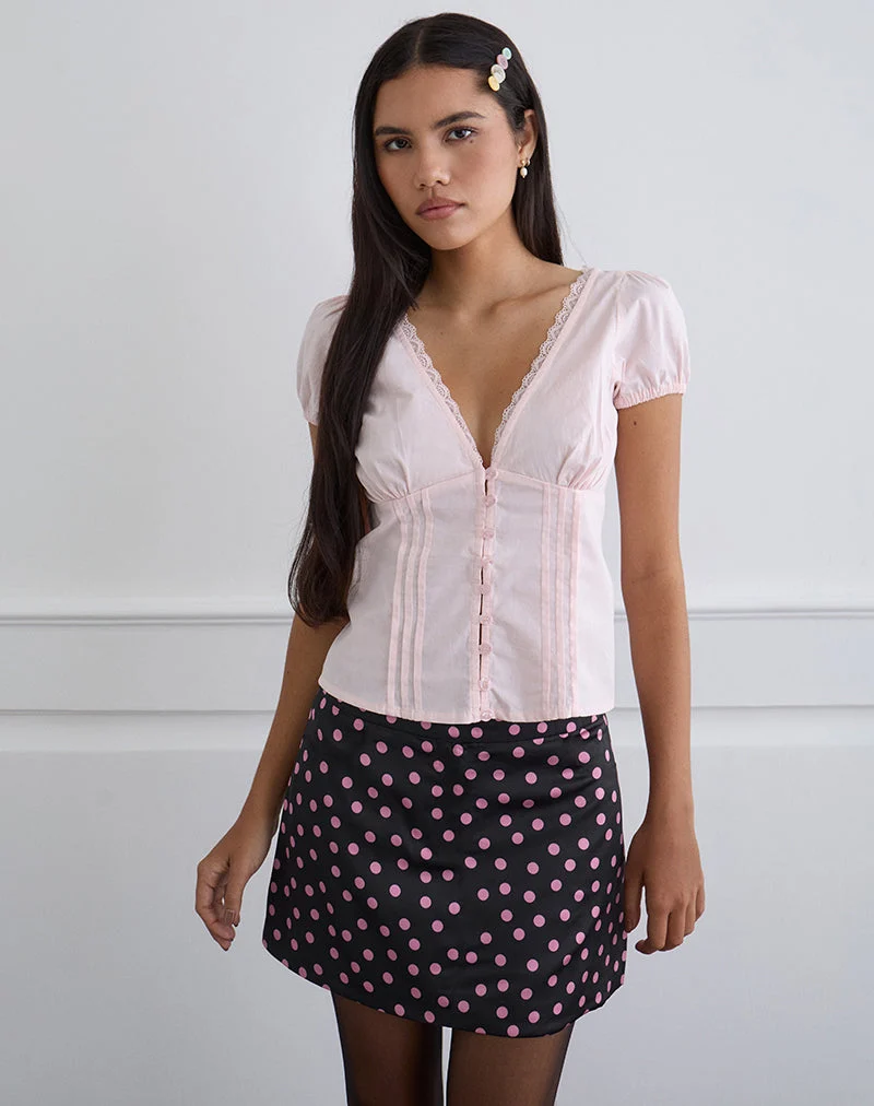 Mini-jupe Maula en satin noir parsemée de pois roses