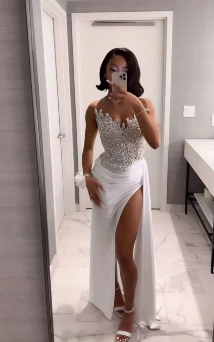 Superbe robe de bal longue blanche coupe trapèze avec fentes