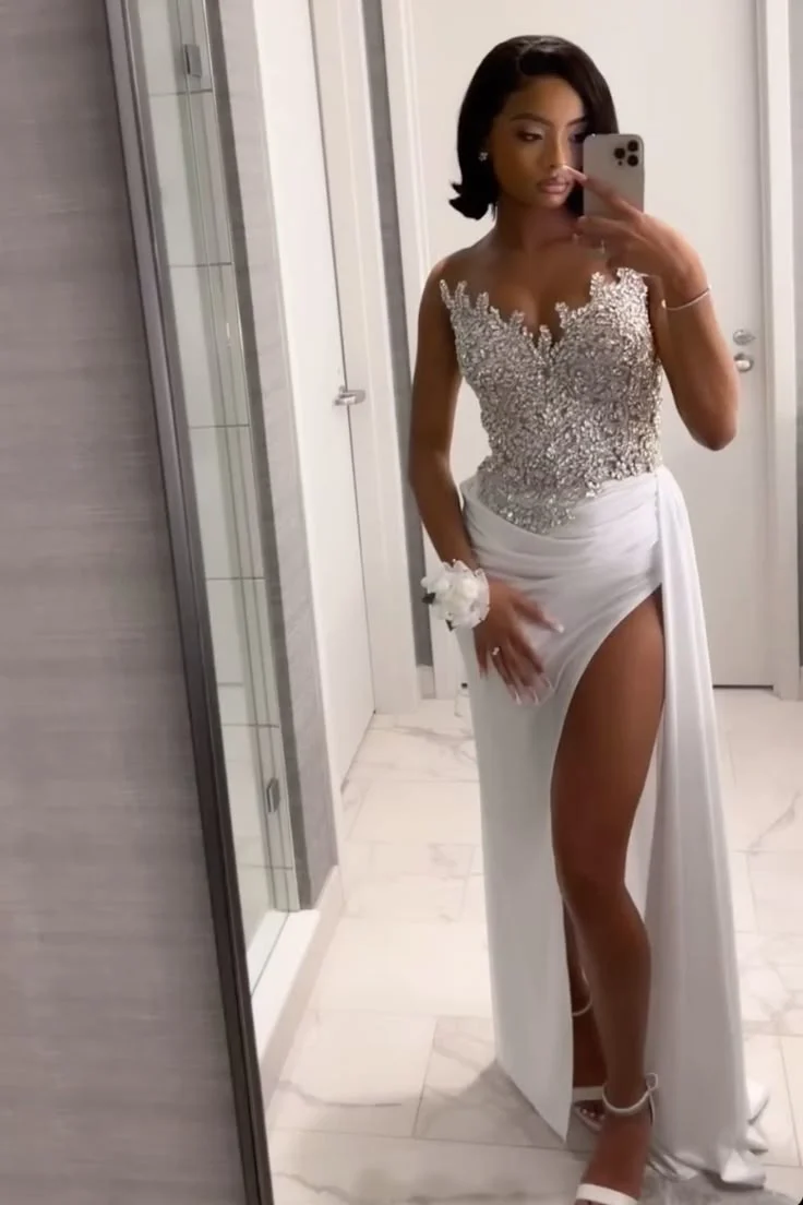 Superbe robe de bal longue blanche coupe trapèze avec fentes