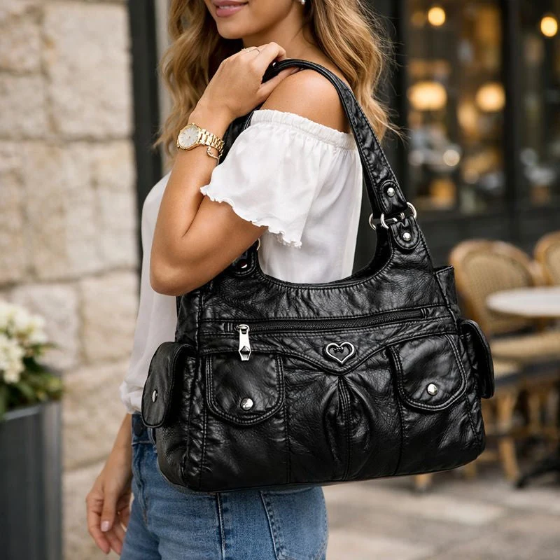 Amara – Sac bandoulière multifonction Amara avec fermeture éclair et bandoulière réglable