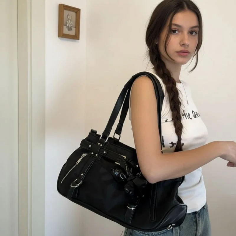 Sac bandoulière compact avec bandoulière réglable
