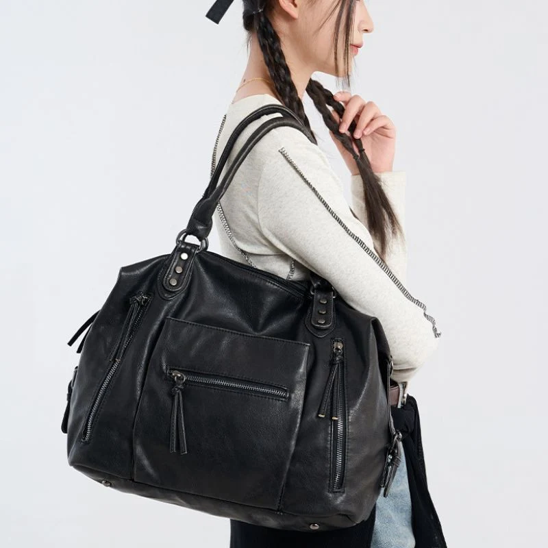 Sac à fermeture éclair avec bandoulière réglable pour usage quotidien