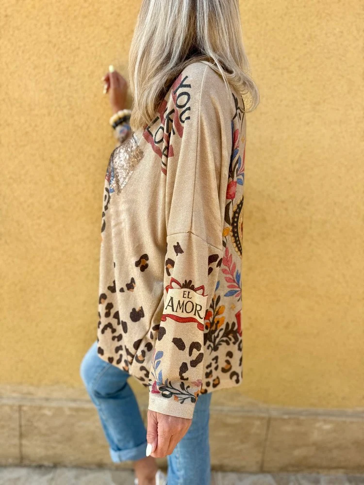 Pull doré méga loose Valentino Frida