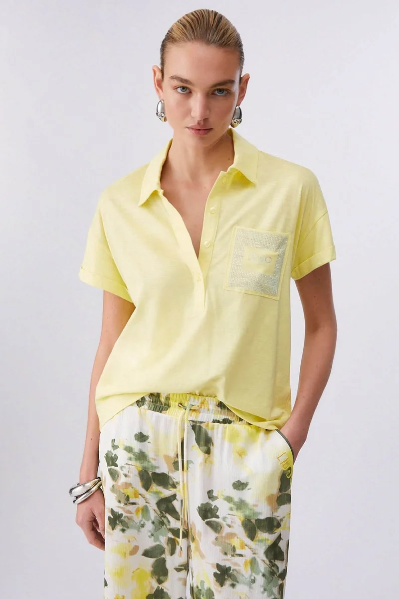 Polo à manches courtes avec poche décorative