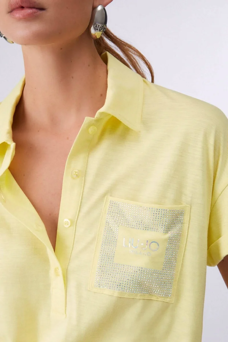 Polo à manches courtes avec poche décorative