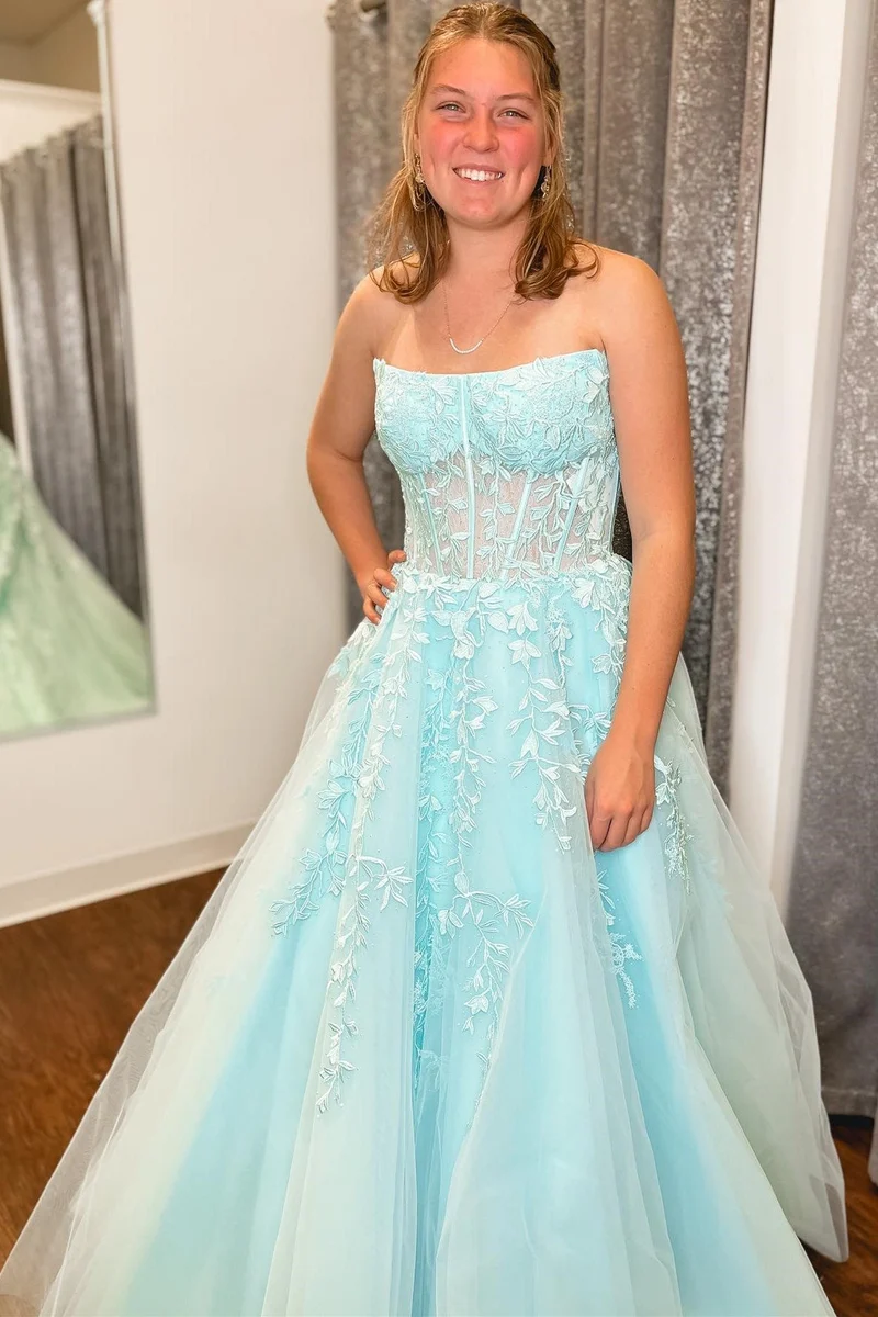 Robe de bal longue transparente sans bretelles avec appliques bleu aqua