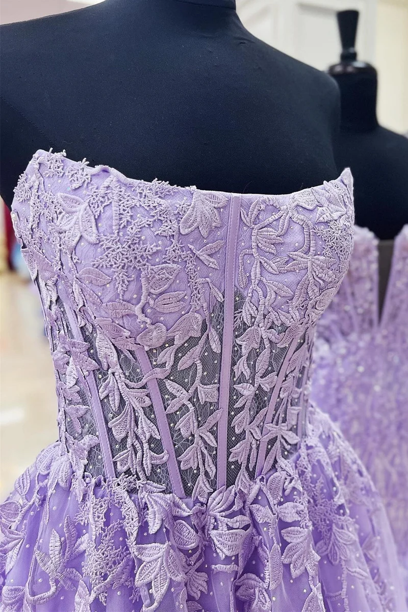 Robe de bal longue transparente sans bretelles avec appliques bleu aqua