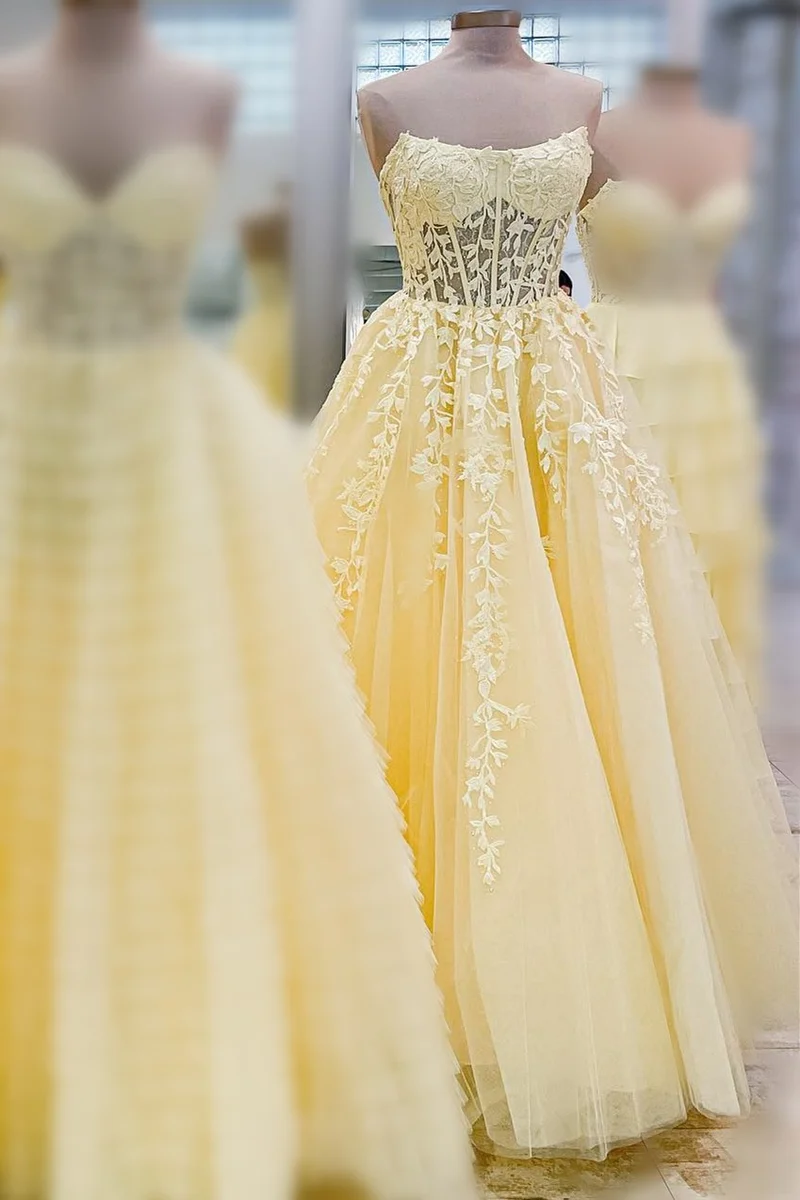 Robe de bal longue transparente sans bretelles avec appliques bleu aqua