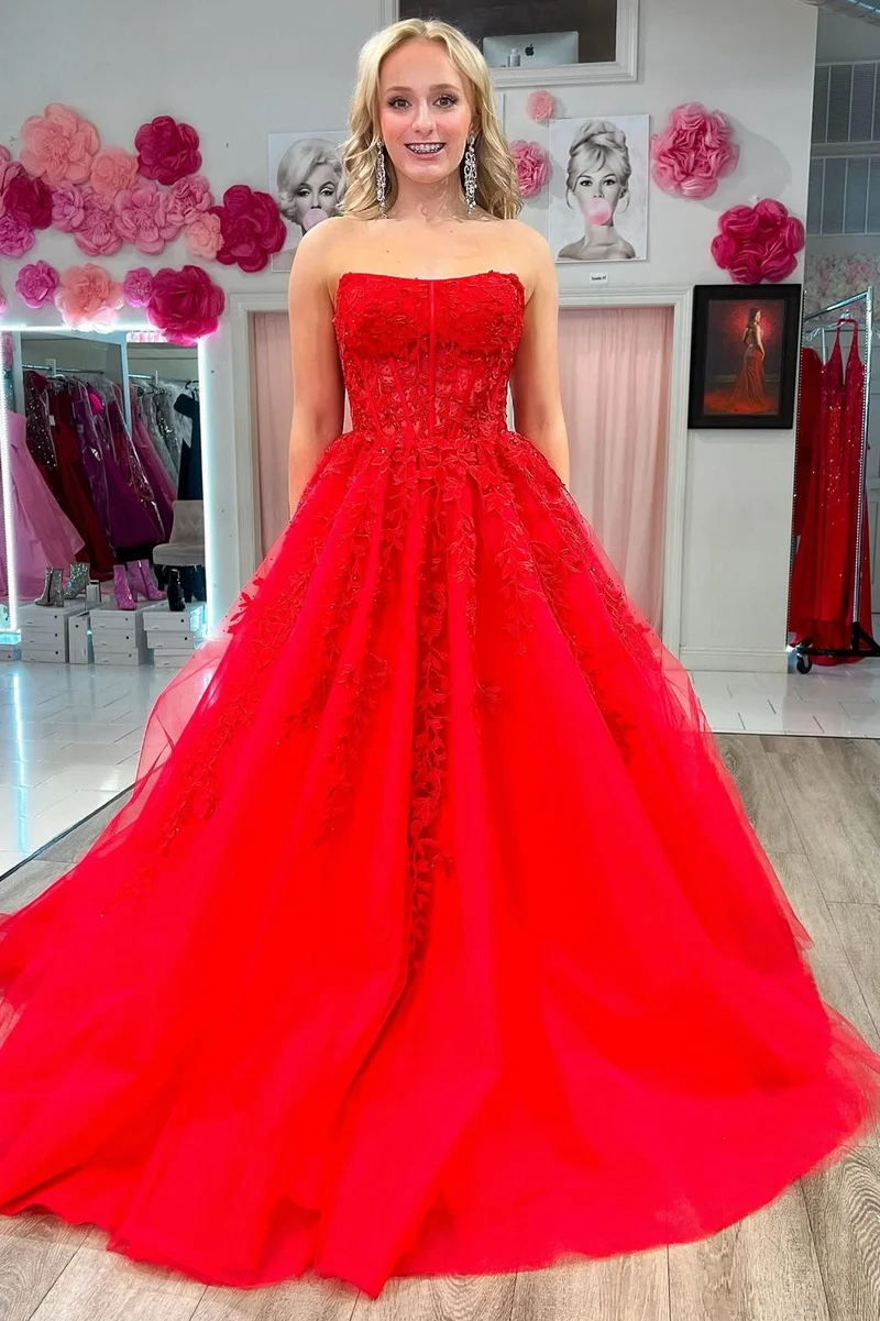 Robe de bal longue transparente sans bretelles avec appliques bleu aqua