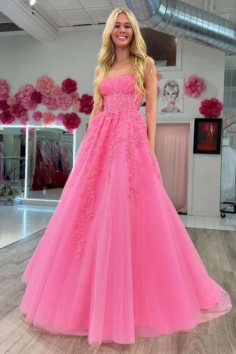 Robe de bal longue transparente sans bretelles avec appliques bleu aqua