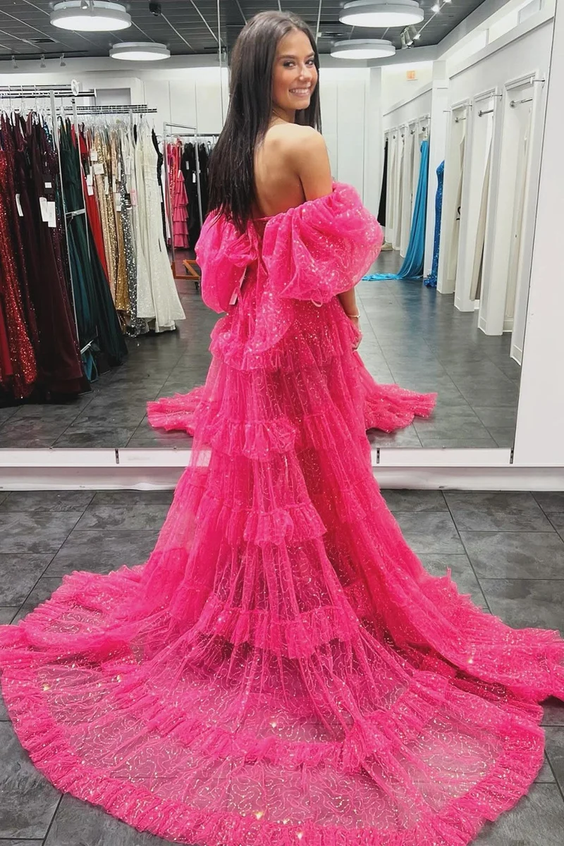 Robe de bal fuchsia deux pièces à manches bouffantes et à volants et paillettes avec fente