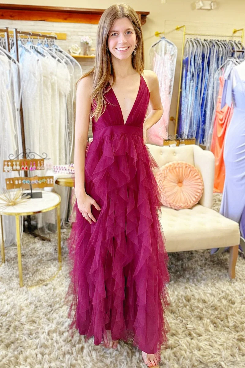 Robe de bal longue bleu poussiéreux à décolleté plongeant en V et à volants