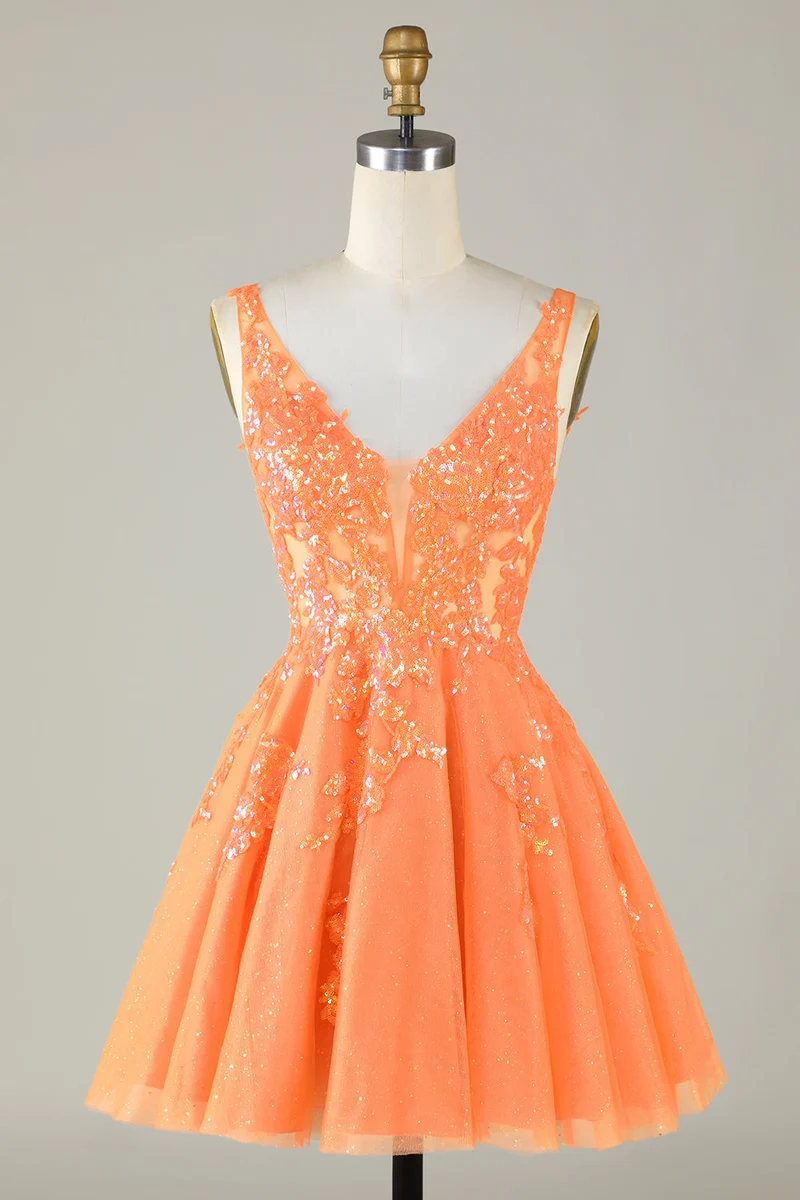Robe de soirée en tulle orange à paillettes et col en V