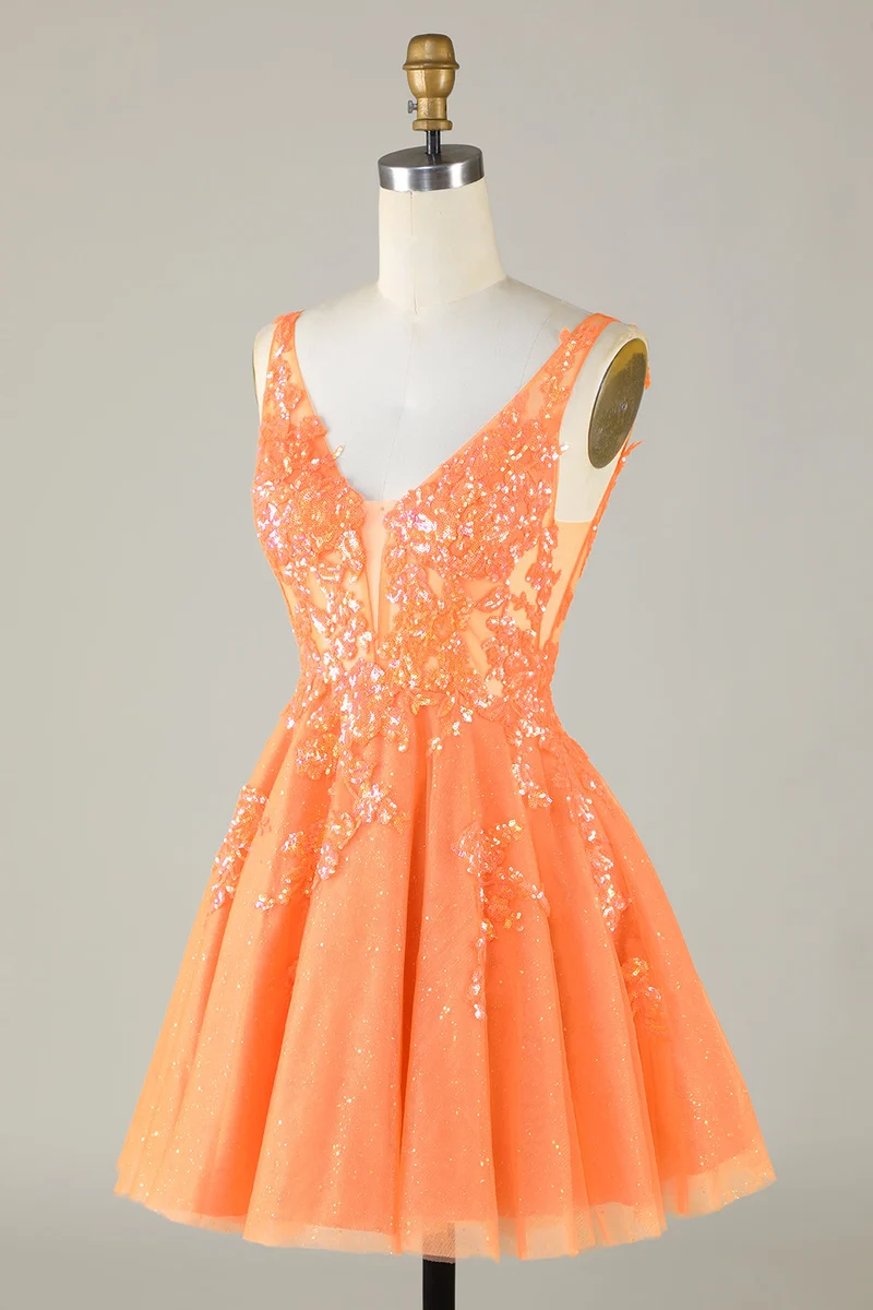 Robe de soirée en tulle orange à paillettes et col en V