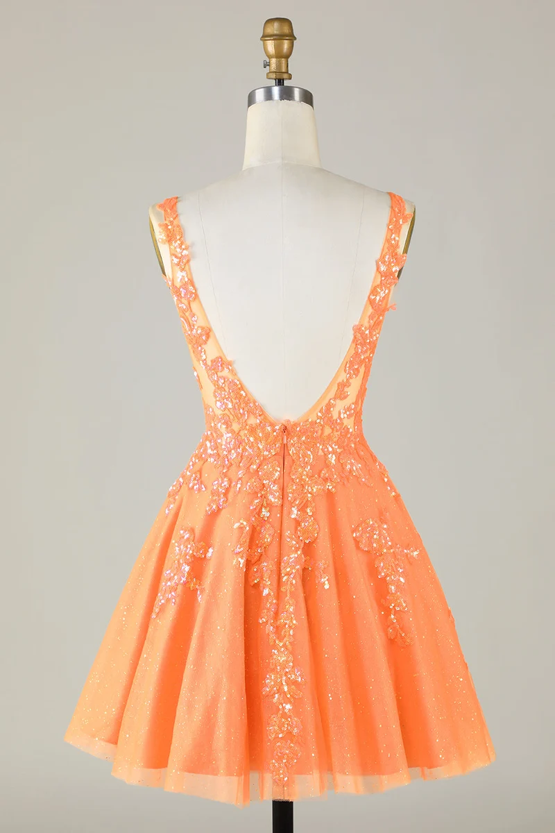 Robe de soirée en tulle orange à paillettes et col en V