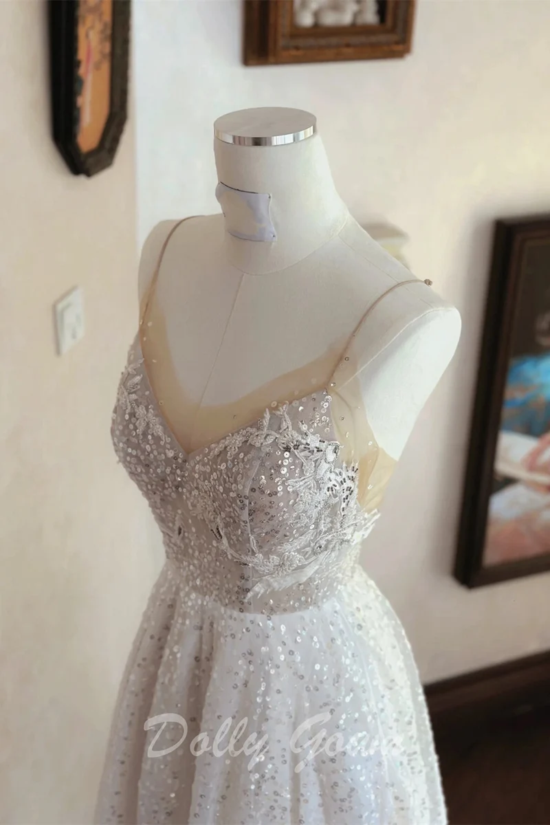 Robe de mariée trapèze transparente à paillettes et bretelles spaghetti