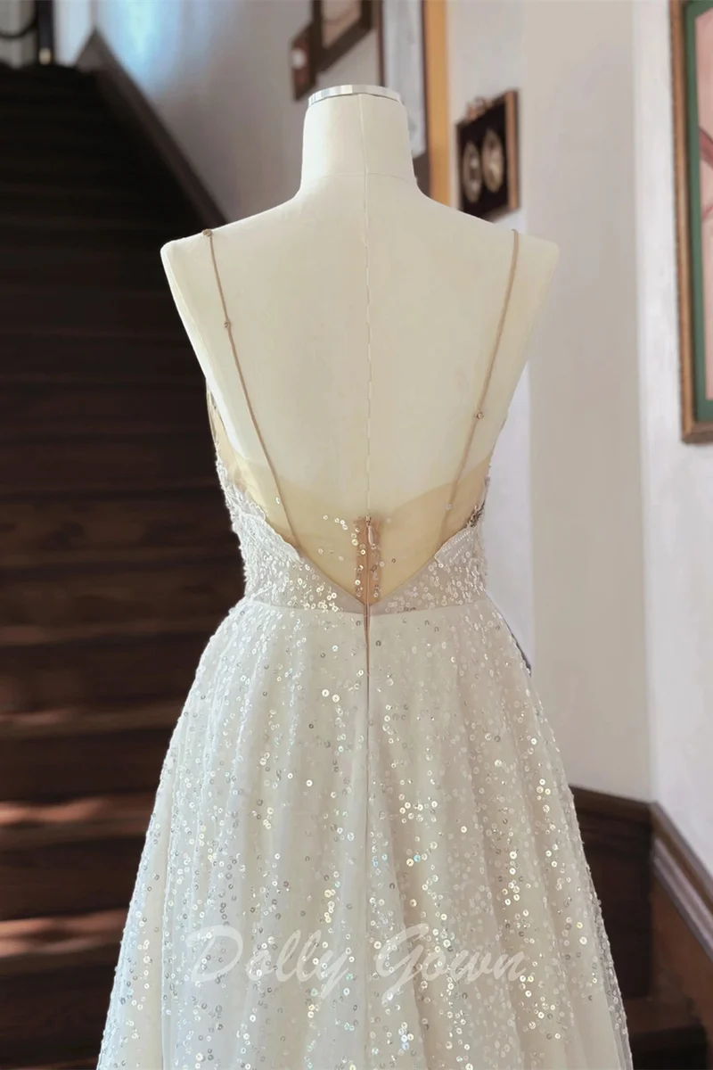 Robe de mariée trapèze transparente à paillettes et bretelles spaghetti