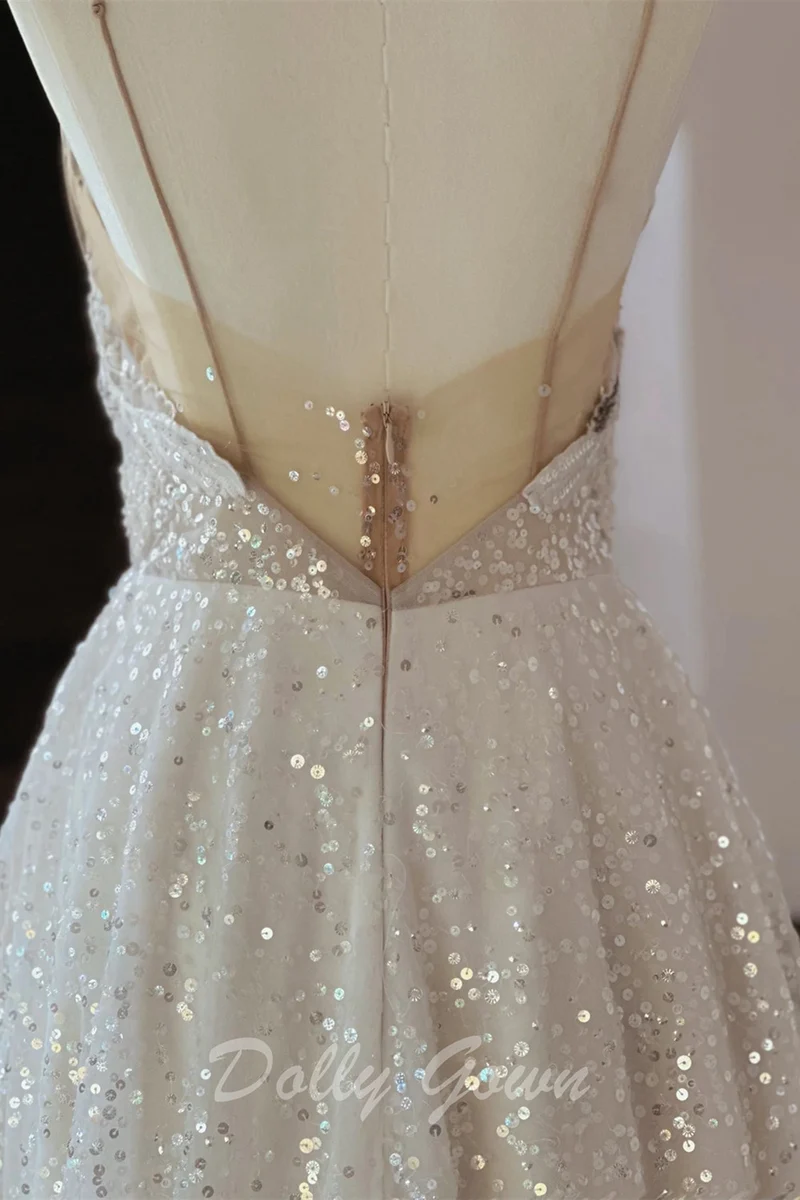 Robe de mariée trapèze transparente à paillettes et bretelles spaghetti