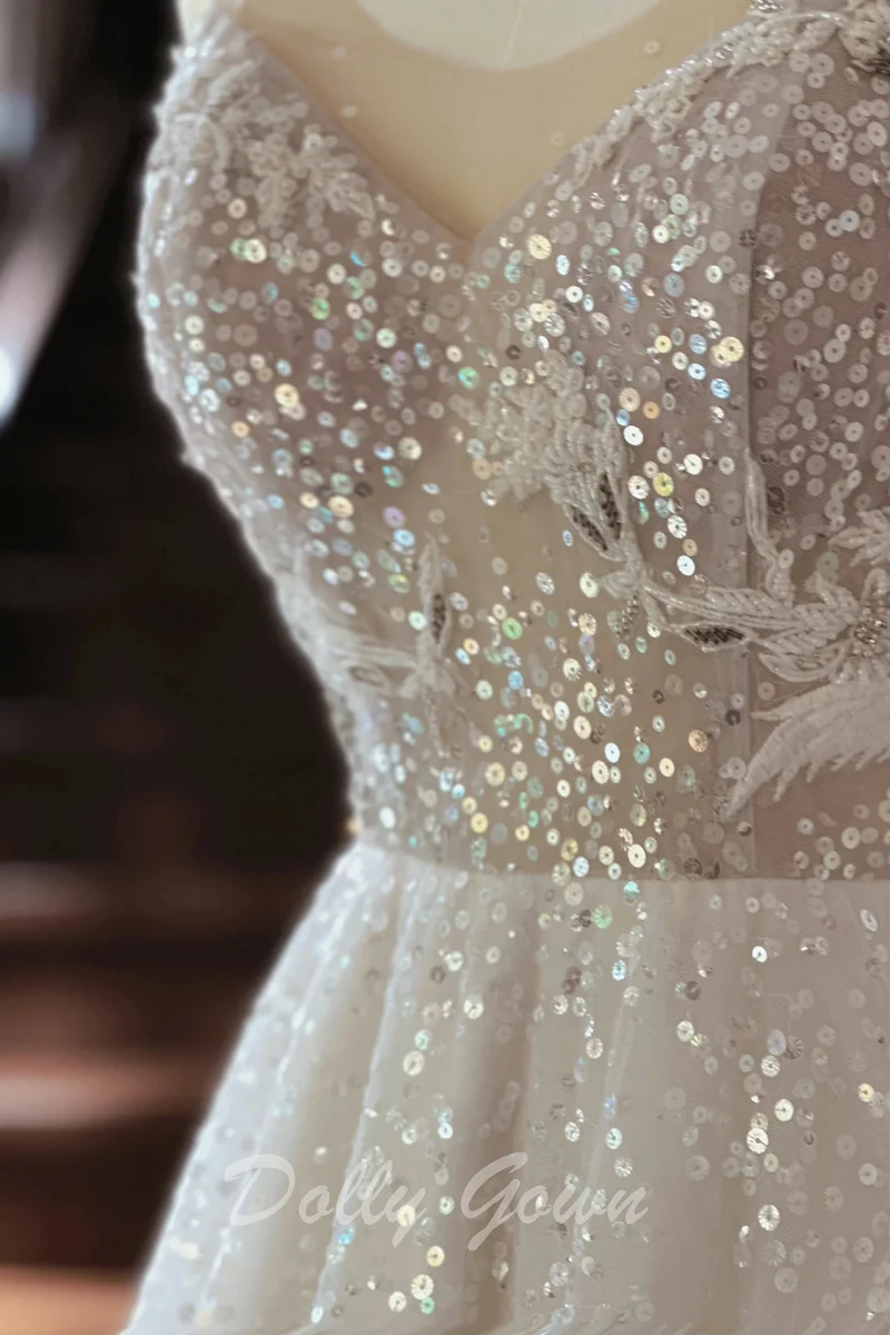 Robe de mariée trapèze transparente à paillettes et bretelles spaghetti