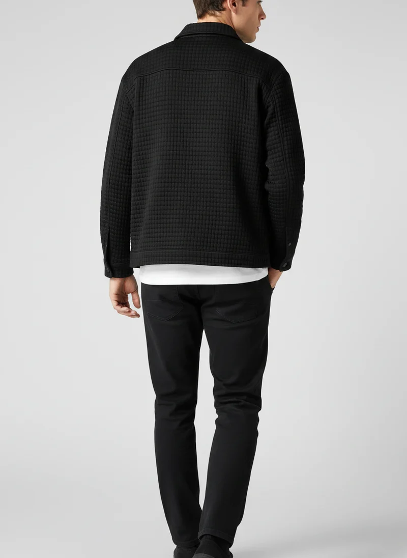 Veste texturée à poches