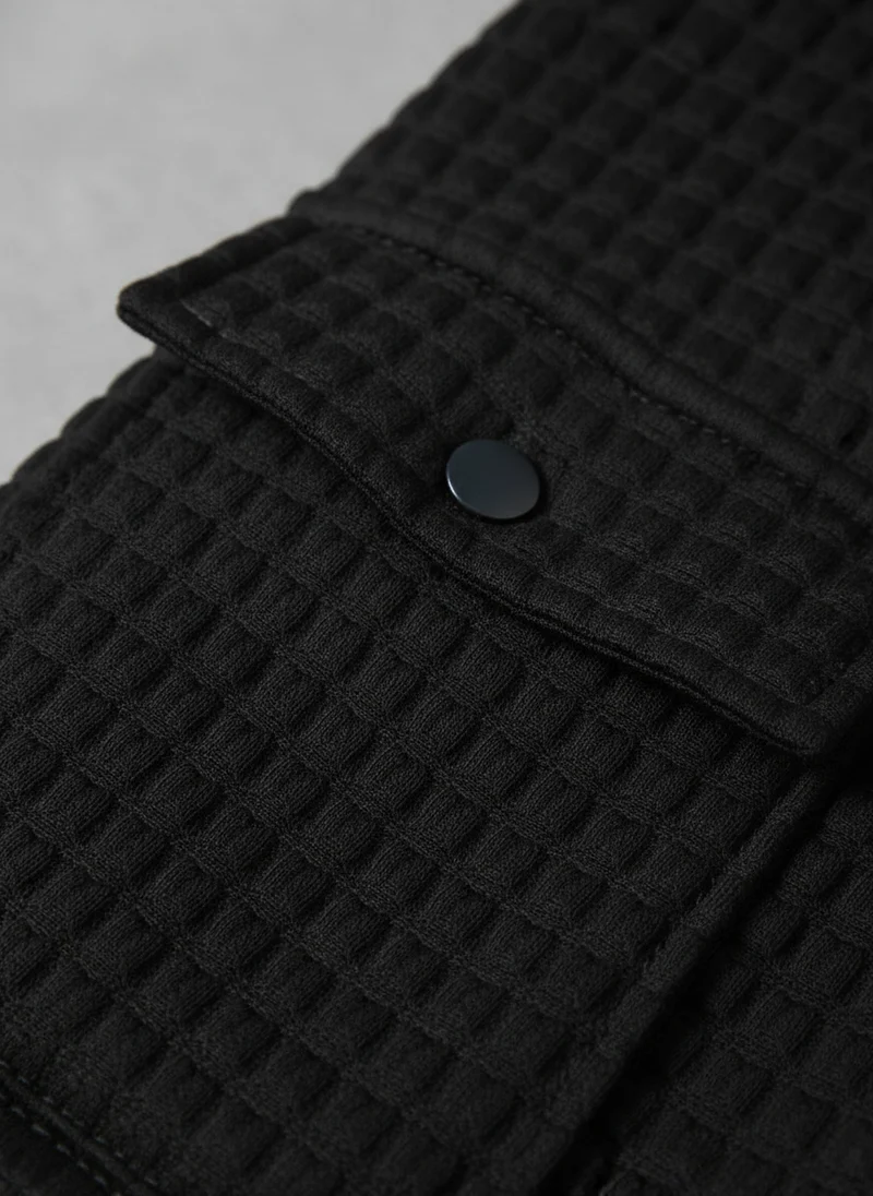 Veste texturée à poches