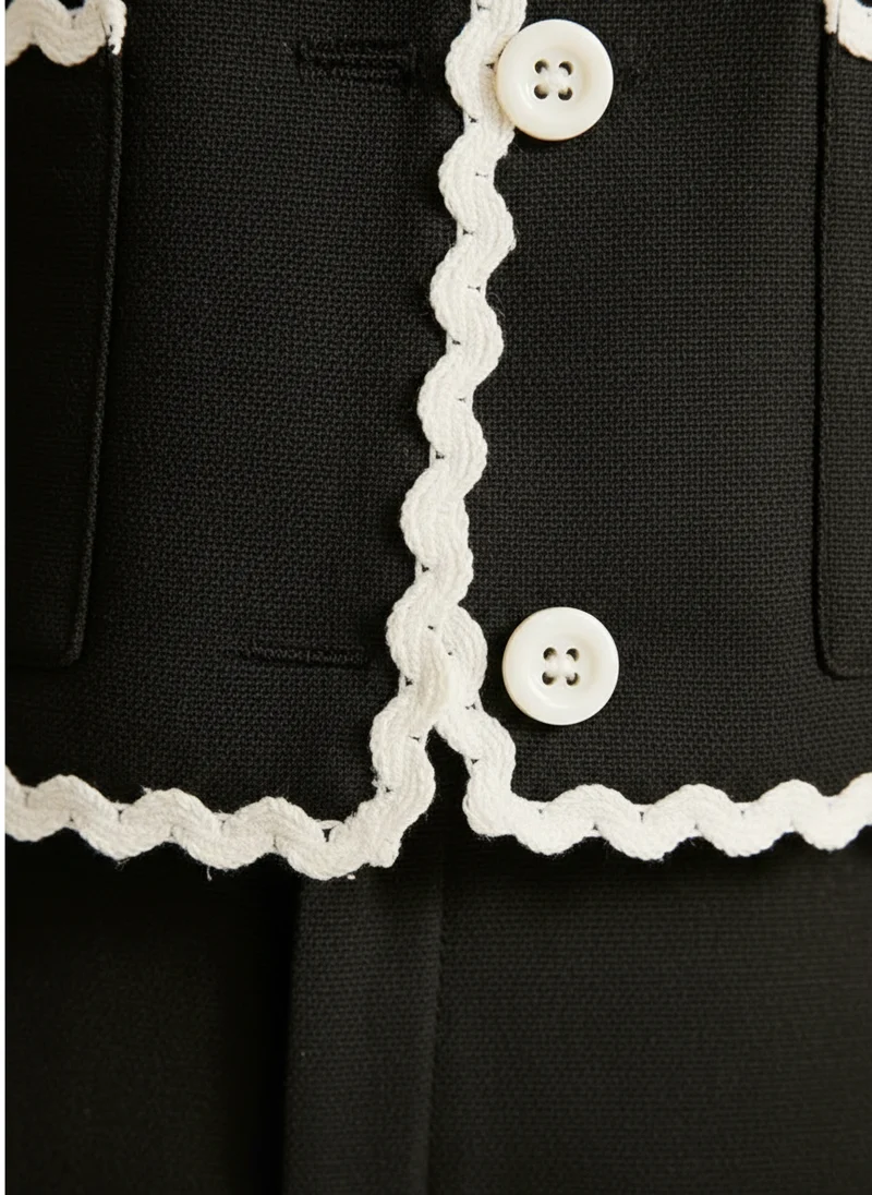 Blazer finition ondulée élégante