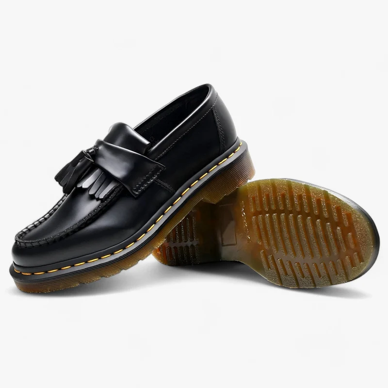 Mocassins élégants à pampilles bout rond finition polie