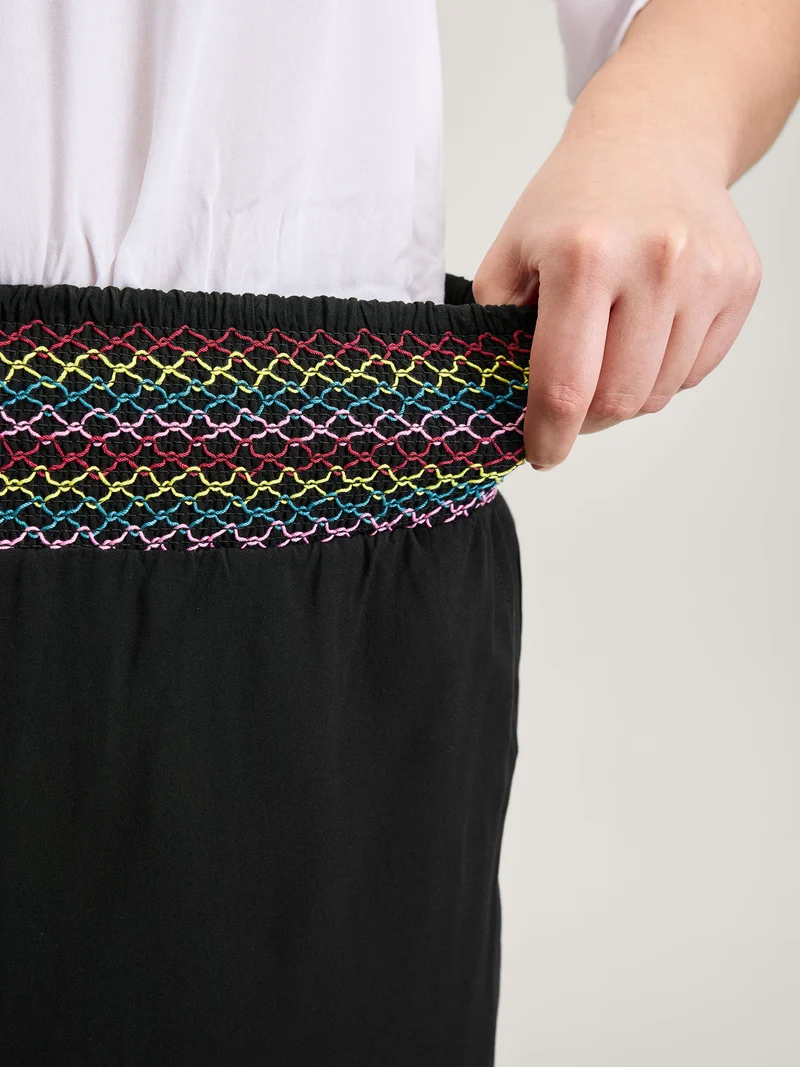 Colorful Shirred Waistband Ruffled Hem Pants