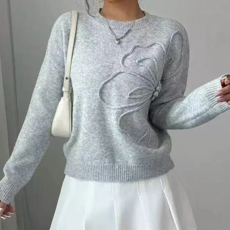 Pull femme àvec manches longues et finitions côtelées