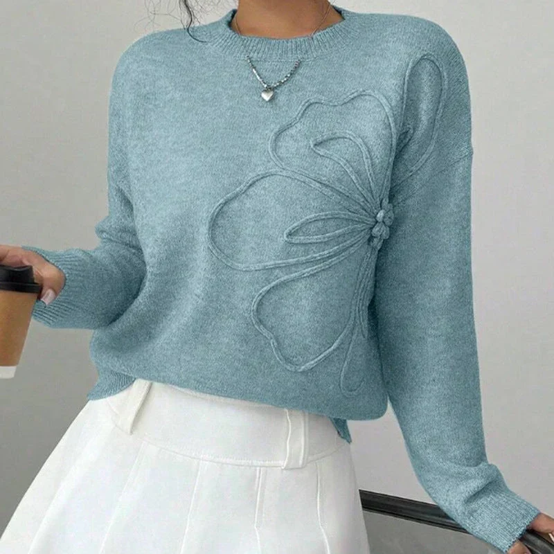 Pull femme àvec manches longues et finitions côtelées