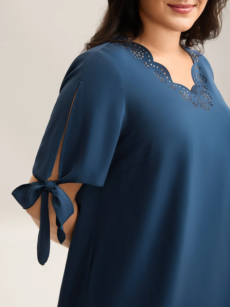 Laser Cut Neckline Knotted Sleeve Blouse
