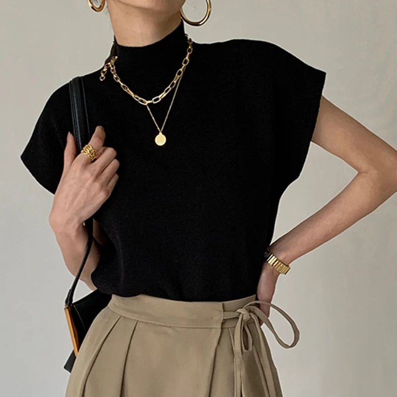 Blouse femme côtelée manches courtes col montant